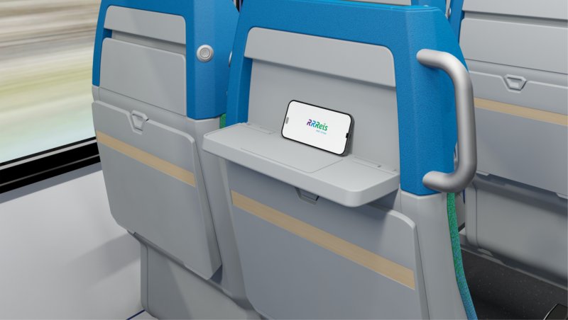 Bij de plaatsen met twee stoelen is er in de rugleuning een handig klaptafeltje verwerkt om een tablet of telefoon op te plaatsen. (Rechten: Stadler / Arriva Nederland)